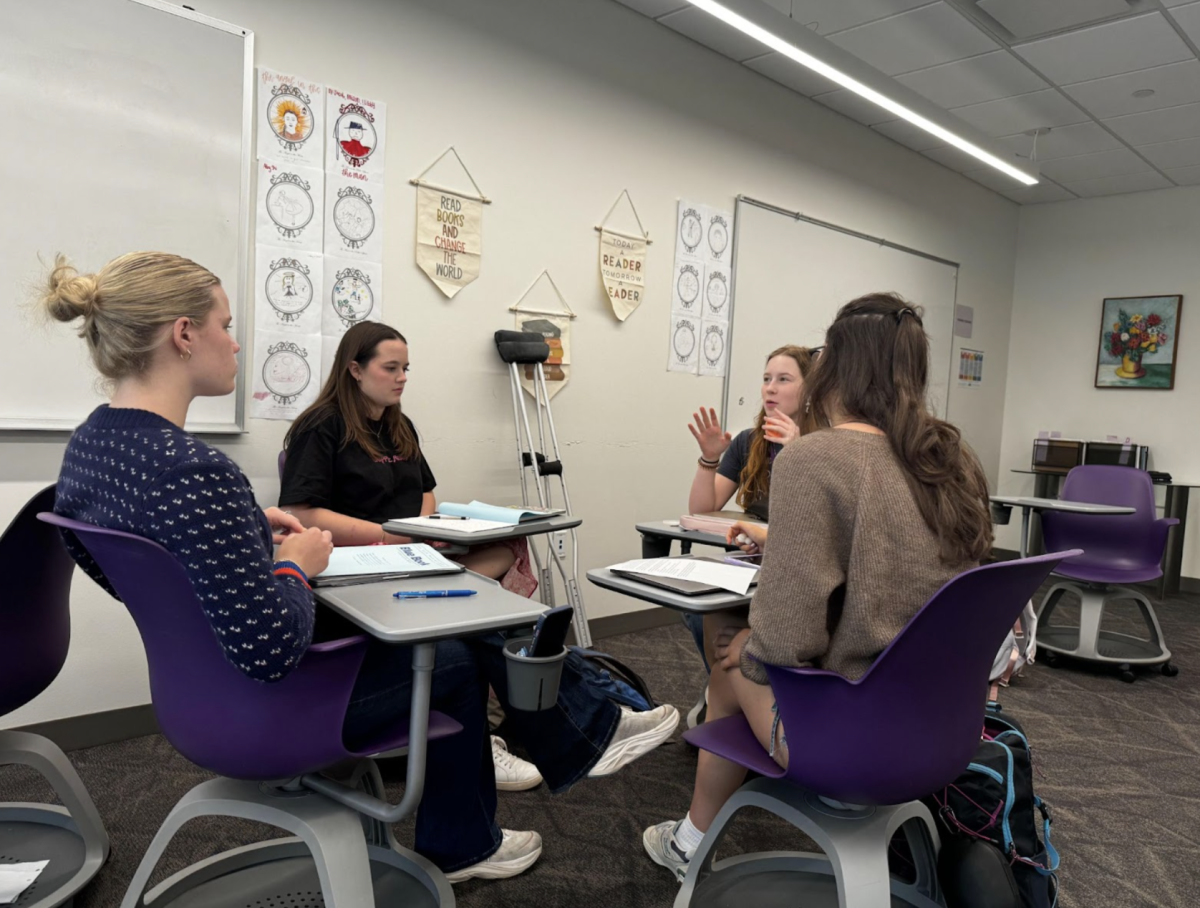 During AP literature, seniors Caroline Loefflor, Caroline Pielop, Amanda Evans, and Allison Whitman talk about the TV show they just finished, Stranger Things. 